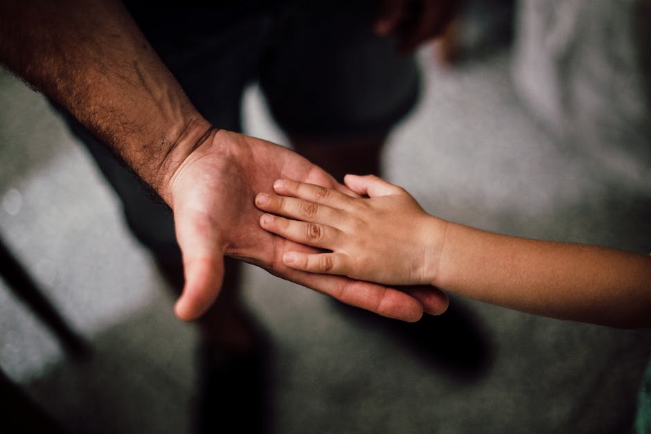 Image depicting a parent engaging in mindful parenting by holding hands with their child, surrounded by colorful illustrations of empathy, awareness, self-regulation, compassionate discipline, trigger identification, and mindful closer.